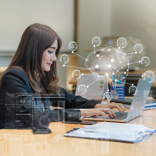 person typing at computer