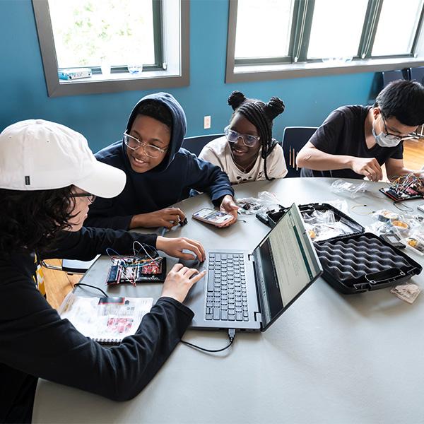 students learning on computers