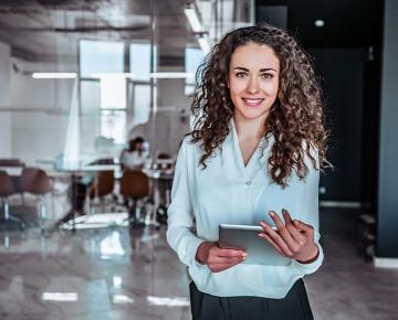 woman holding tablet
