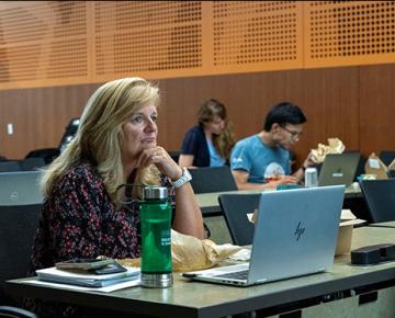 pitt member using laptop